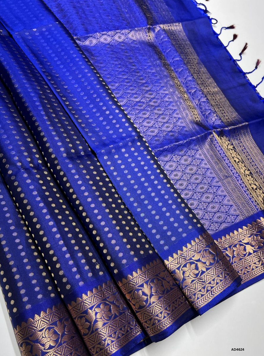 The Blue Kanchi Border Soft Silk Saree with 1000 Bhutta and Half Fine Tested Gold Zari is a majestic handwoven creation that radiates regal charm and cultural richness, making it perfect for weddings, temple ceremonies, and festive occasions.