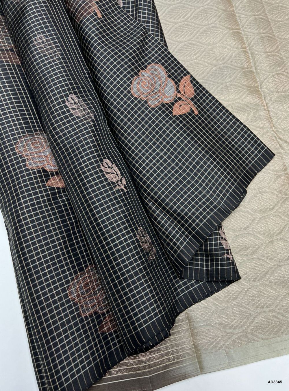 "Handwoven Black body with Grey pallu Checkered Bhutta Soft Silk Saree featuring gold zari motifs and borders"