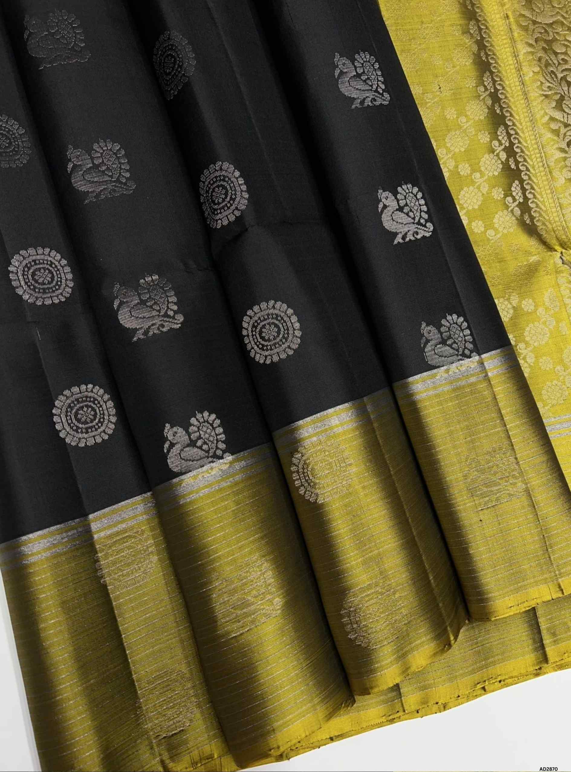 Handwoven Black body with Olive Yellow border Bhutta Soft Silk Saree featuring gold zari motifs