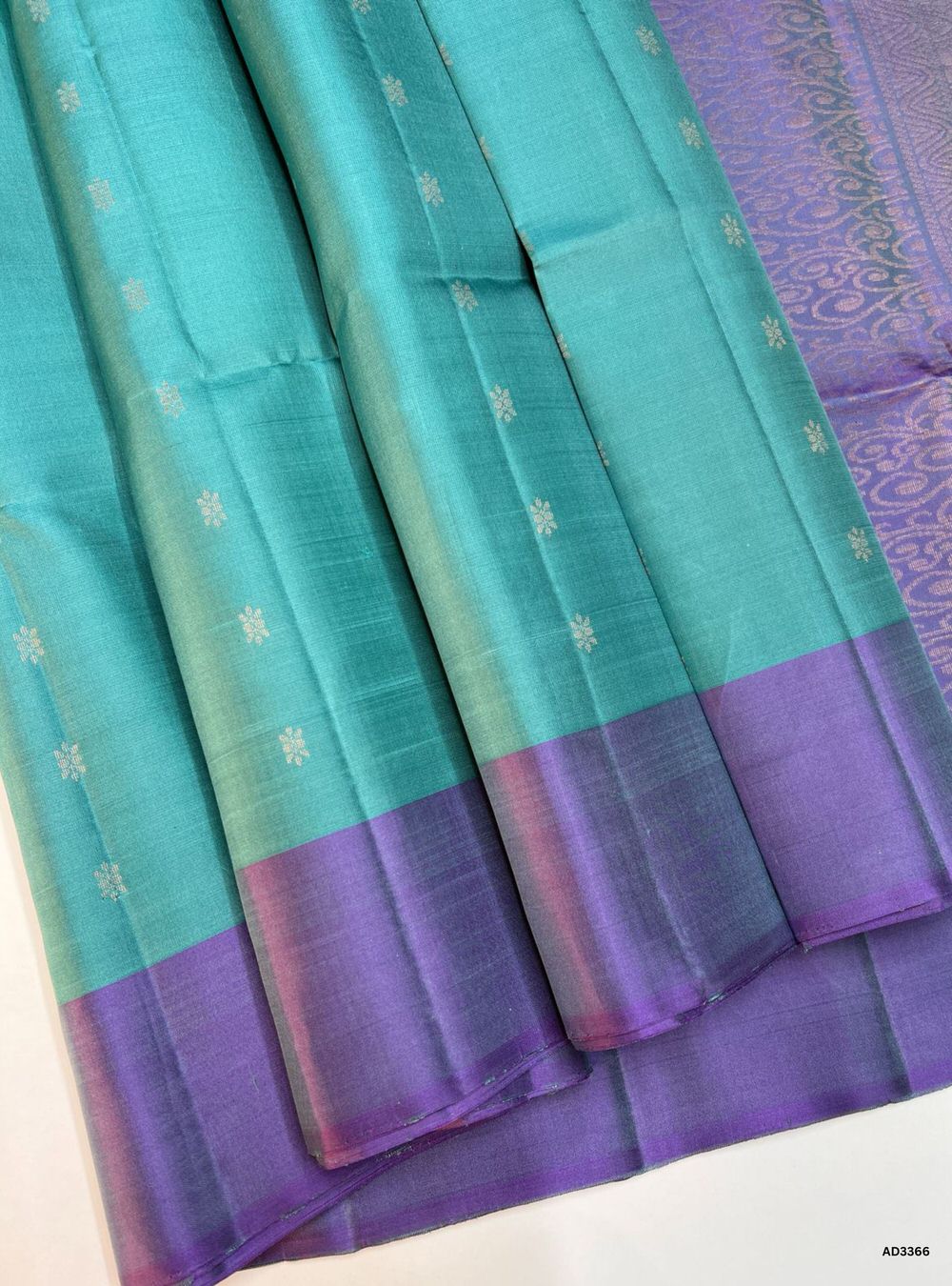 "Handwoven Cadet Blue body with Lavender pallu Bhutta Soft Silk Saree featuring gold zari motifs and borders"