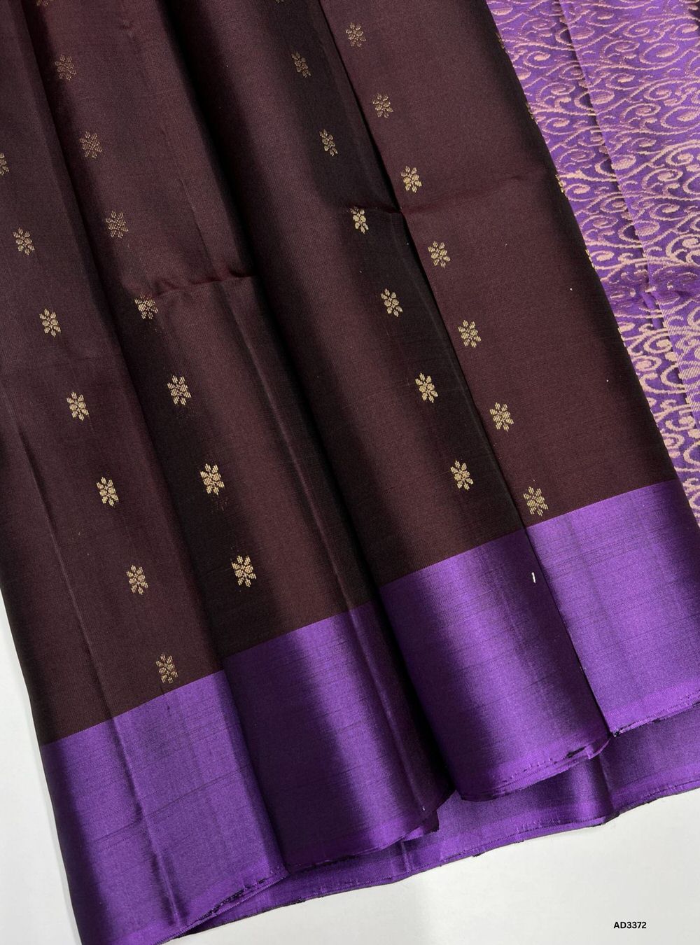 "Handwoven Coffee Brown body with Lavender pallu Bhutta Soft Silk Saree featuring gold zari motifs and borders"