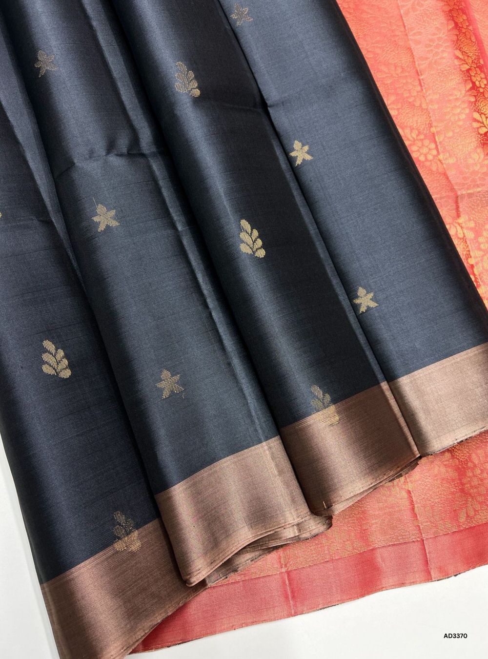 "Handwoven Grey body with Mauve Pink pallu Bhutta Soft Silk Saree featuring gold zari motifs and borders"
