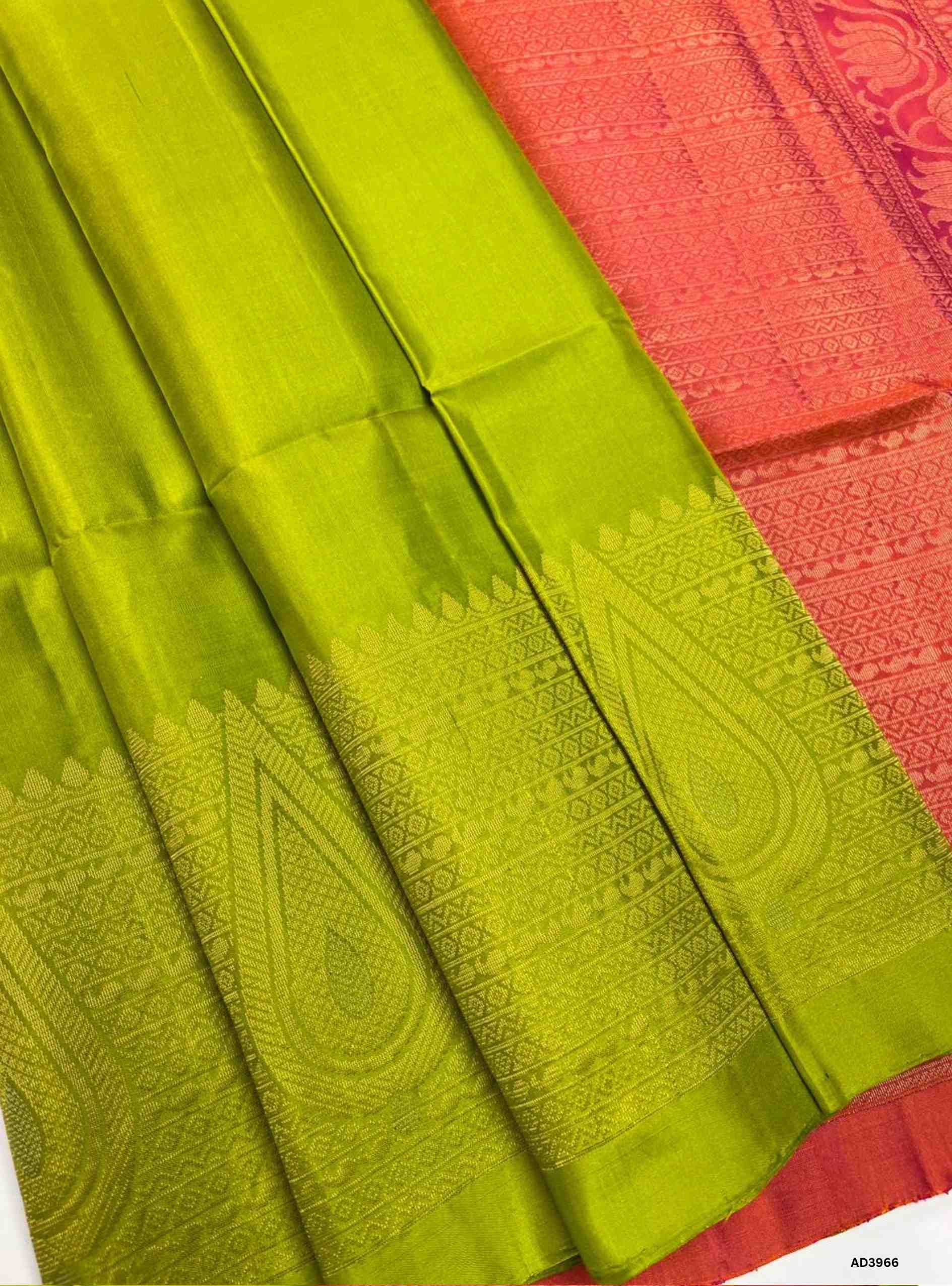 The Lime Green & Rust Orange Turning Border Soft Silk Saree is a festive handwoven masterpiece that radiates vibrancy and heritage charm. The lively lime green shade symbolizes prosperity and freshness, while the rust orange adds warmth and celebratory brilliance. The turning border, woven with pure gold zari and traditional motifs, enhances the saree’s grandeur, making it ideal for weddings, temple ceremonies, and cultural gatherings. With its lustrous drape and shimmering pallu, this saree embodies South