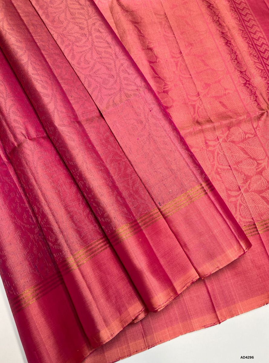 The Pastel Peach Bridal Soft Silk Saree is a graceful handwoven masterpiece that radiates elegance, purity, and cultural richness. The pastel peach shade conveys serenity, femininity, and auspicious charm, while the temple‑inspired Kanchipuram border enriched with pure gold zari adds grandeur. Its lustrous drape and intricate bridal motifs make it a perfect choice for weddings, temple ceremonies, and festive occasions. A timeless creation, it blends soft pastel beauty with heritage artistry, ensuring the br