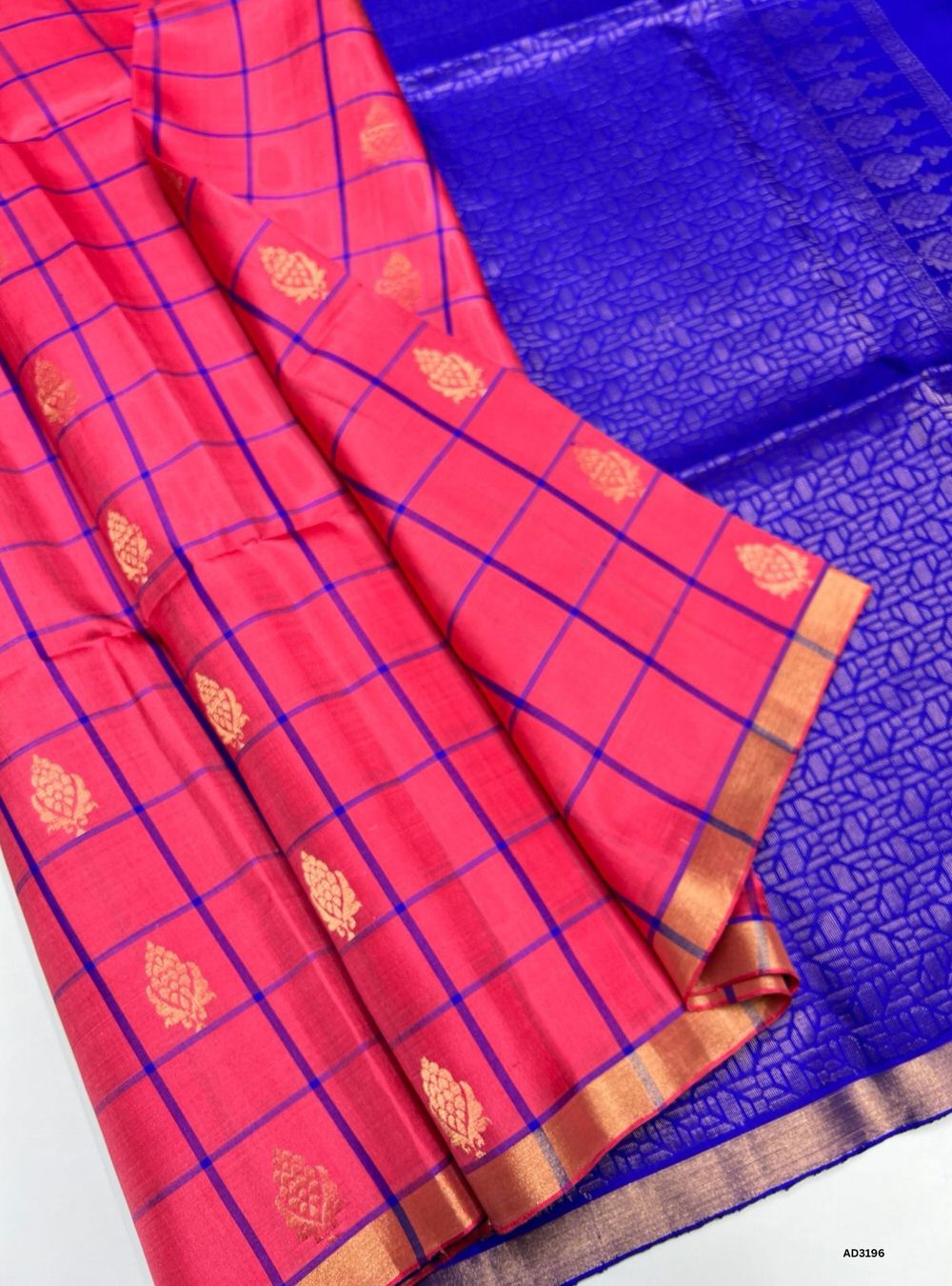 "Handwoven Pink body with Blue pallu Checkered Bhutta Soft Silk Saree featuring gold zari motifs and borders"