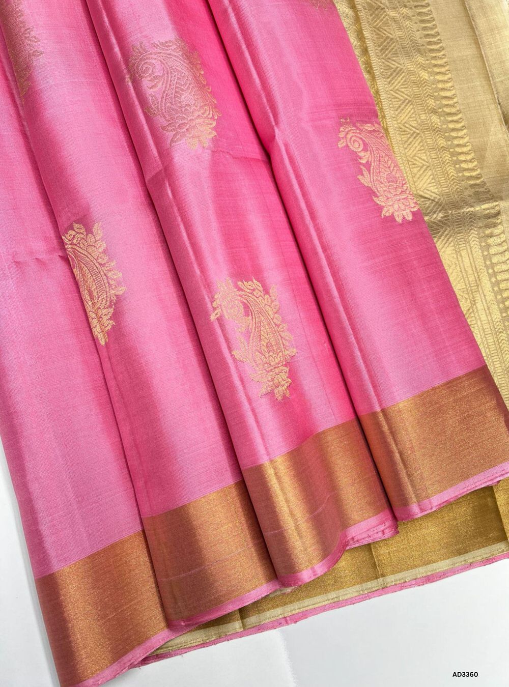 "Handwoven Pink body with Ivory pallu Bhutta Soft Silk Saree featuring gold zari motifs and borders"