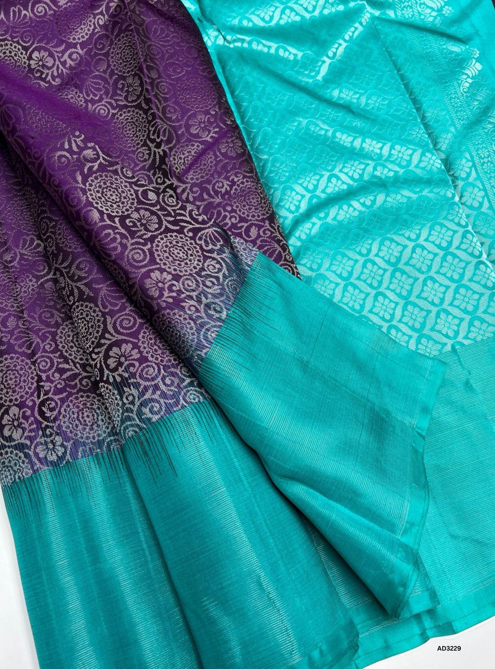 "Handwoven Plum body with Turquoise pallu Full Brocade Soft Silk Saree featuring striped gold zari border"
