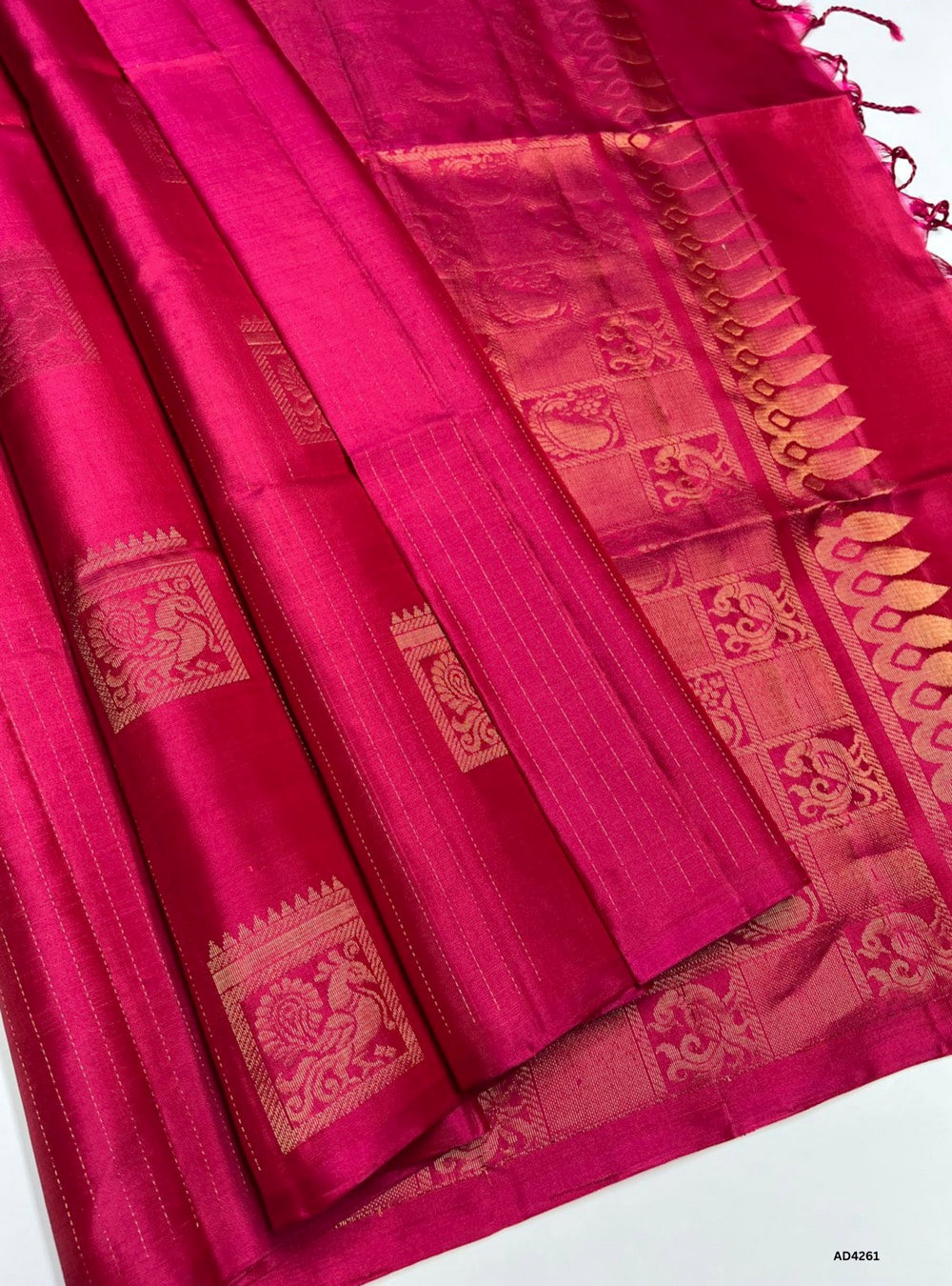 The Reddish Pink Bhutta Soft Silk Saree is a radiant handwoven creation that blends festive charm with cultural elegance. The reddish pink shade conveys warmth, devotion, and celebratory vibrance, while the bhutta motifs add intricate detailing across the body, enhancing its traditional appeal. Accented with zari borders and a lustrous drape, this saree is perfect for weddings, temple ceremonies, and festive occasions. A timeless piece of artistry, it combines jewel‑tone vibrance with motif‑rich heritage we