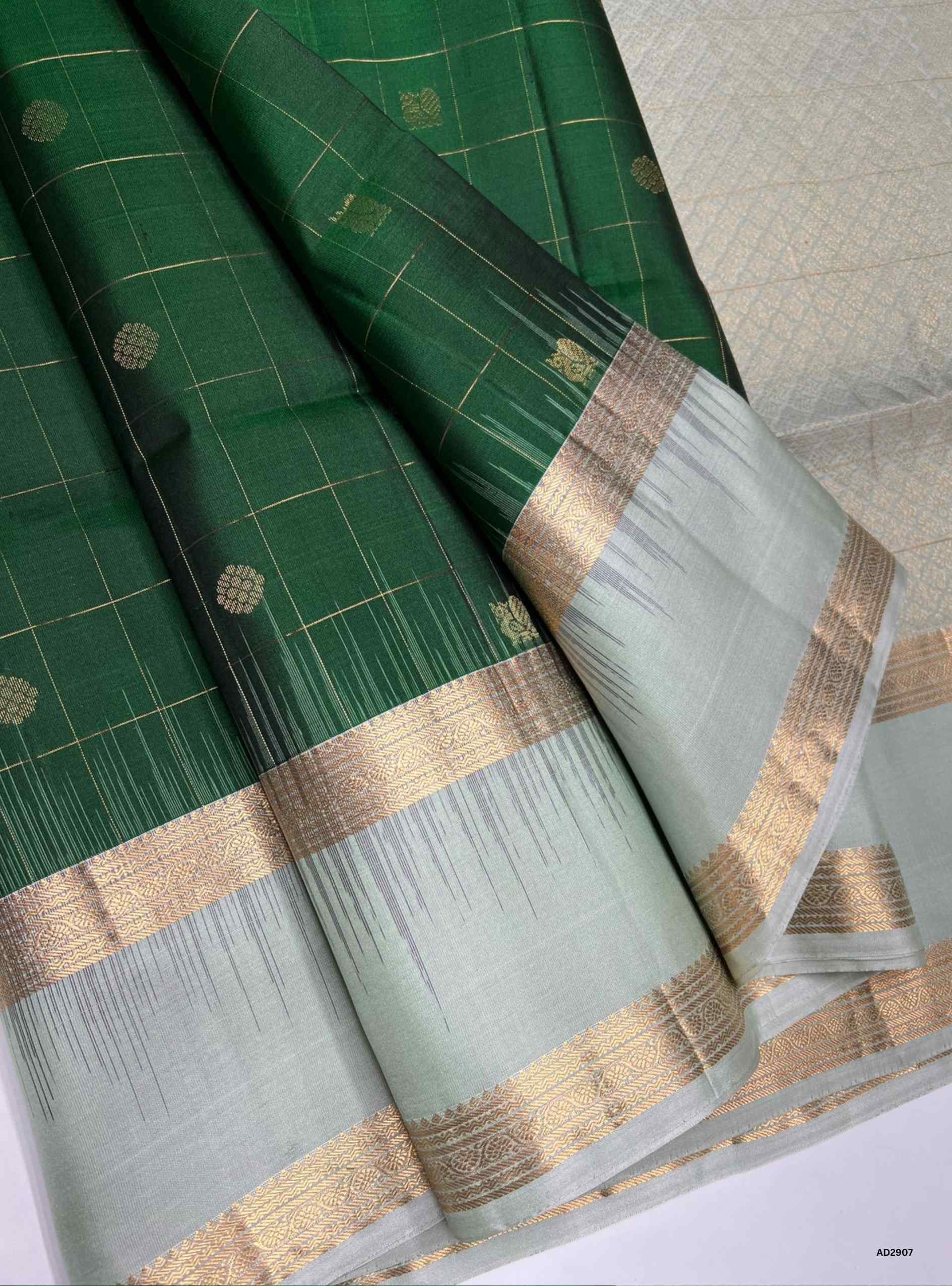 Checkered Soft Silk Saree in Green body with Ice Blue pallu, Retapet border design, Ikat handwoven motifs, Half Fine Gold Zari, 6.25m length including blouse.