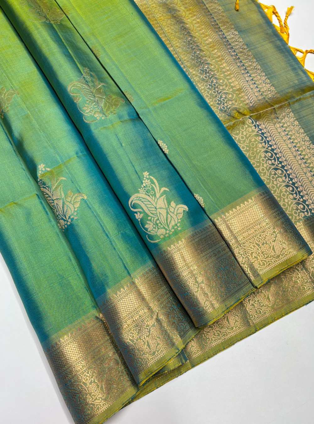 Dual Tone Green Soft Silk Saree with jacquard border and gold zari motifs, handwoven mulberry silk, festive wear.