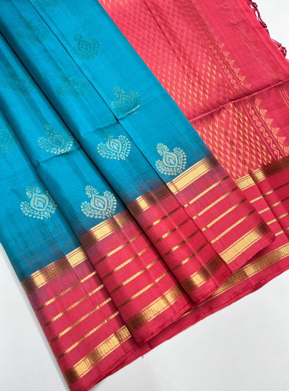 one blue and one red, with gold patterns on a white background