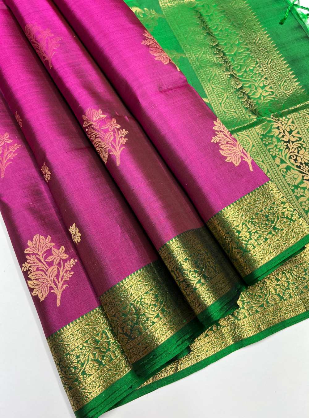 Raspberry and Green Soft Silk Saree with jacquard border and gold zari motifs, handwoven mulberry silk, festive wear.