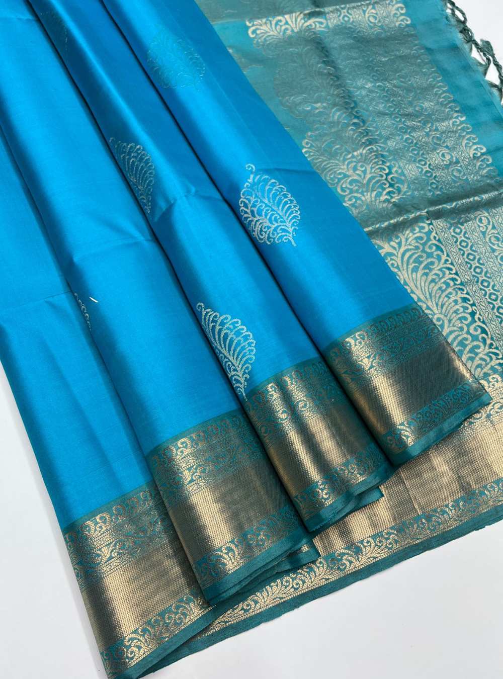 Sky Blue and Mint Blue Soft Silk Saree with jacquard border design and gold zari motifs.