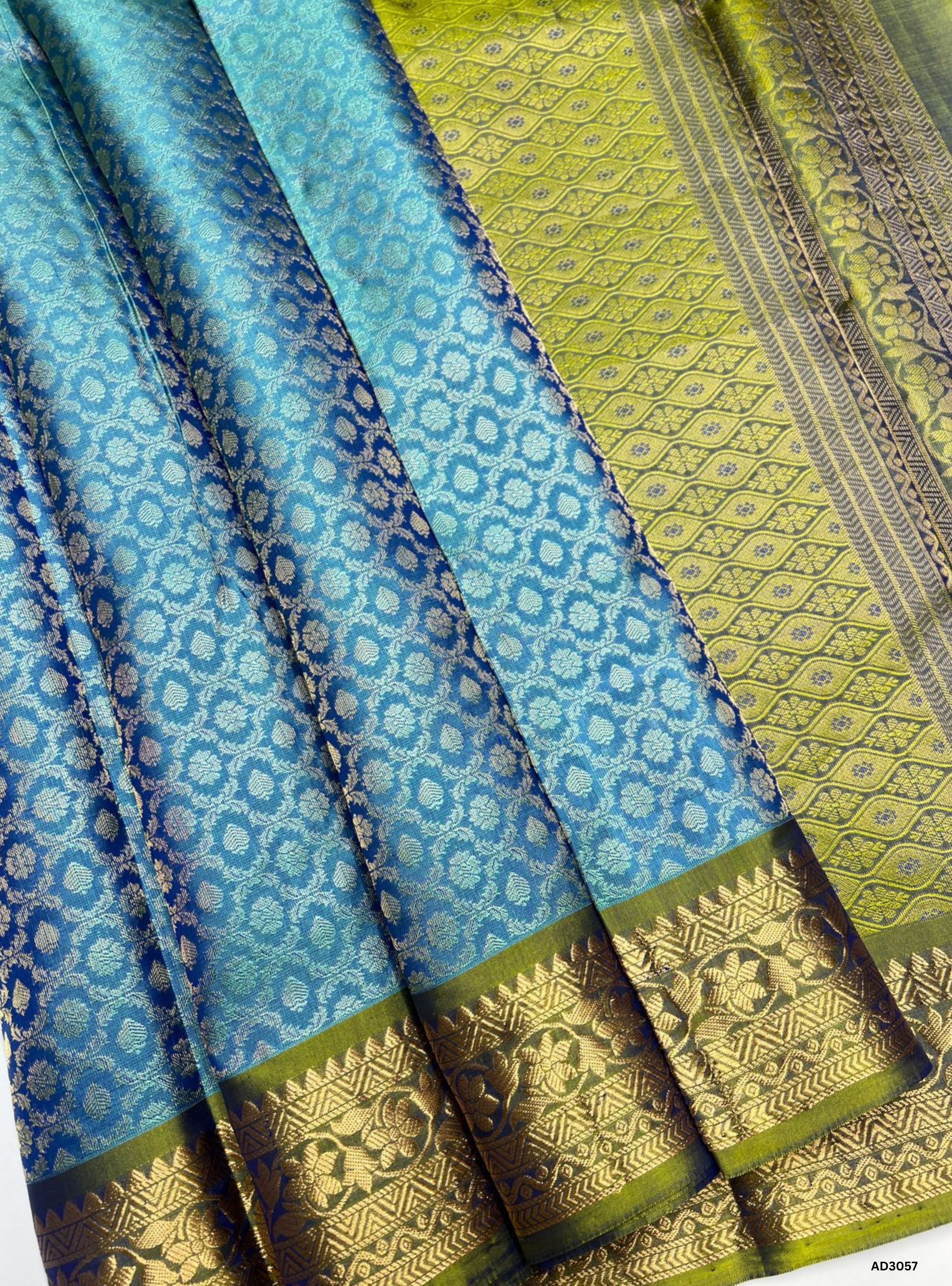 "Handwoven Blue body with Green pallu Full Brocade Jacquard Border Soft Silk Saree featuring gold zari motifs"