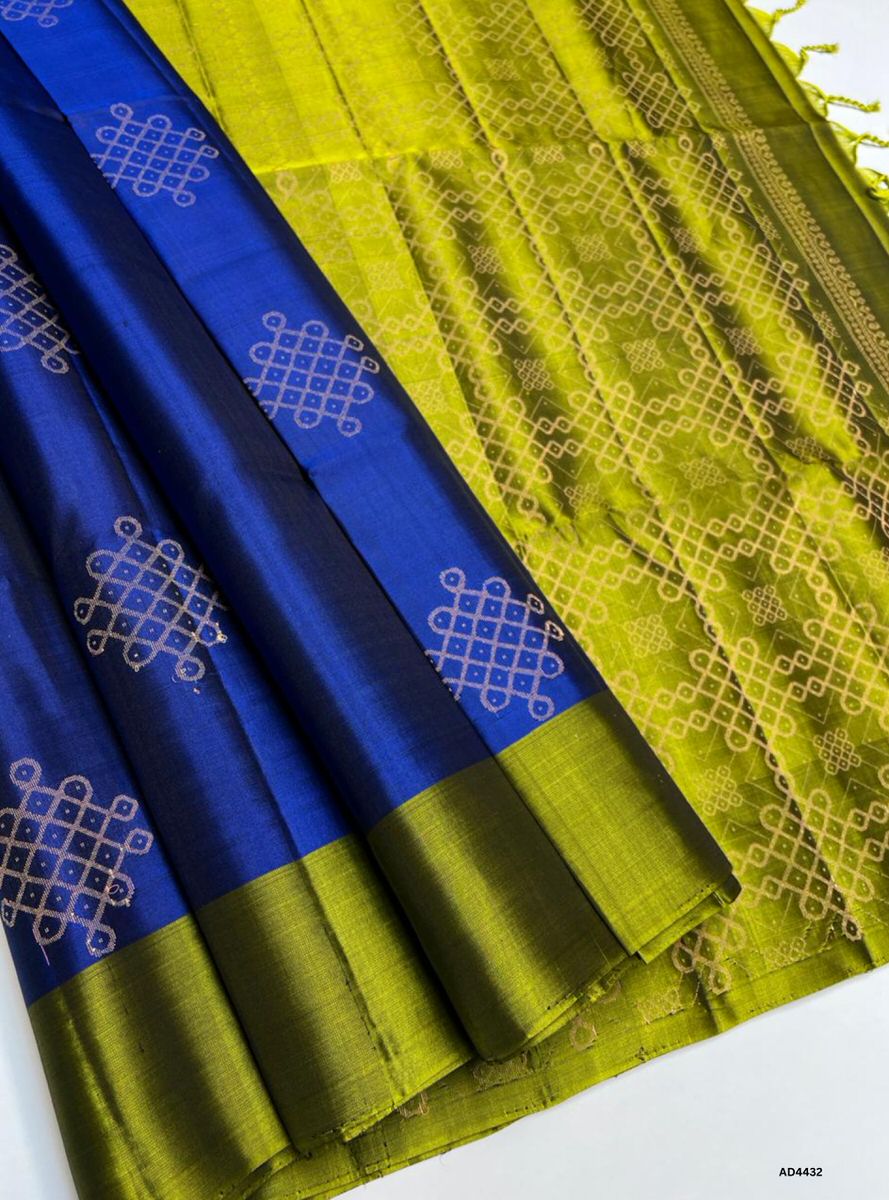 The Blue & Green Kolam Soft Silk Saree with Pure Gold Zari is a radiant handwoven creation that unites festive brilliance with cultural artistry, making it ideal for weddings, temple ceremonies, and traditional celebrations.