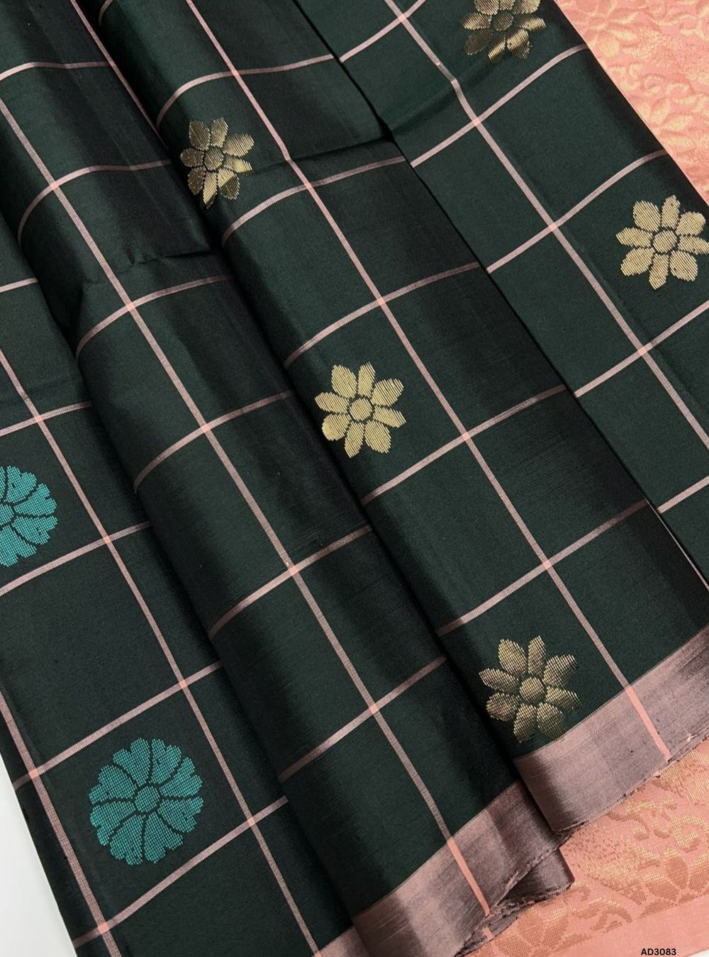 "Handwoven Bottle Green body with Peach pallu Checkered Bhutta Soft Silk Saree featuring gold zari motifs and borders"