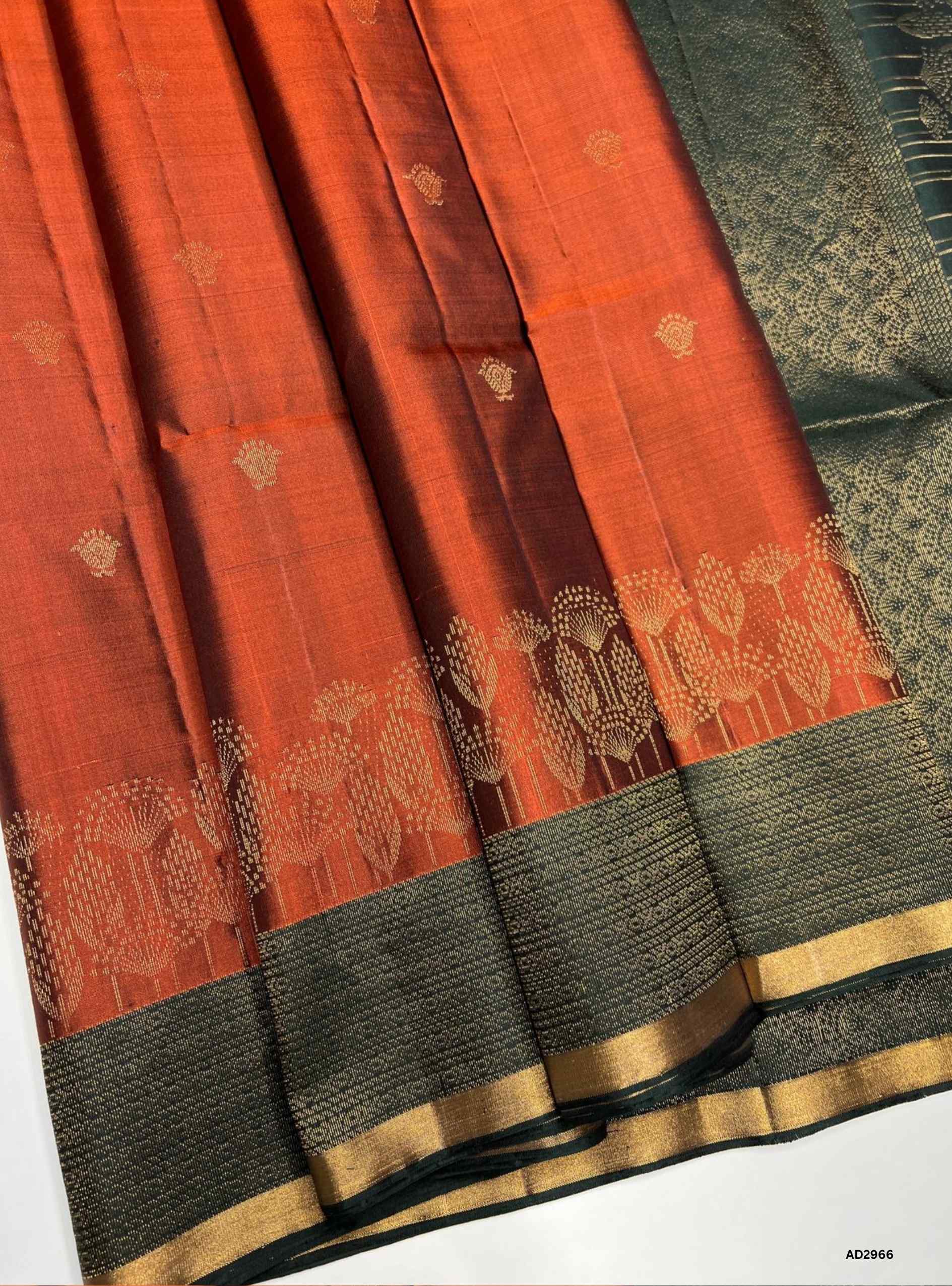 Handwoven Brown body with Dark Green pallu Turning Border Soft Silk Saree featuring gold zari motifs"