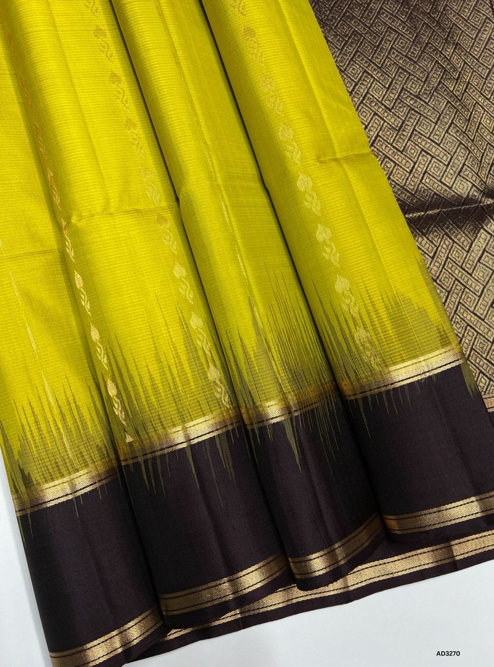 "Handwoven Chartreuse body with Dark Coffee Brown pallu Bhutta Soft Silk Saree featuring gold zari motifs and borders"