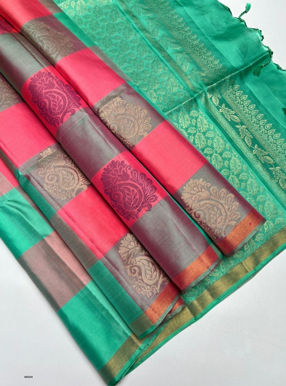 Colorful saree with intricate patterns on a white background