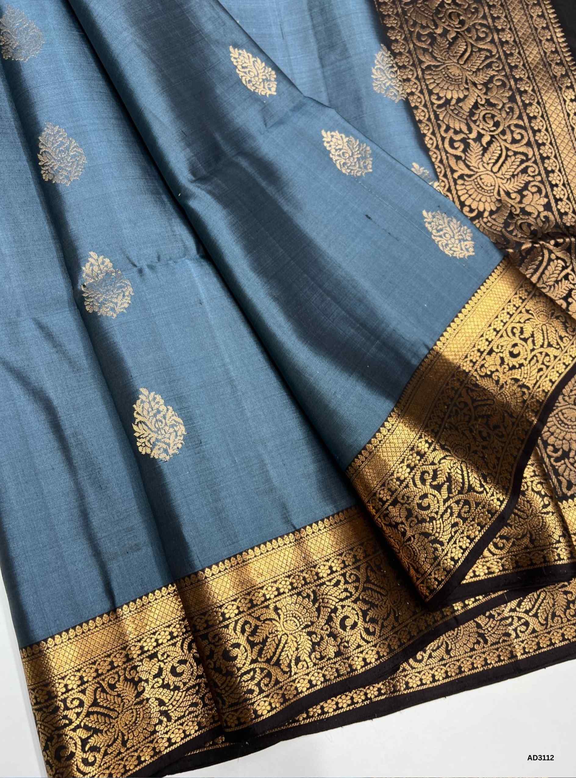 "Handwoven Dark Blue Grey body with Dark Coffee Brown pallu Bhutta Soft Silk Saree featuring gold zari jacquard border"