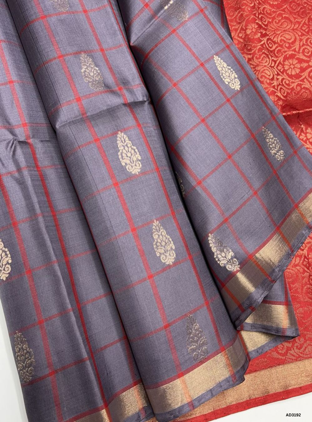 "Handwoven Grey body with Red pallu Checkered Bhutta Soft Silk Saree featuring gold zari motifs and borders"