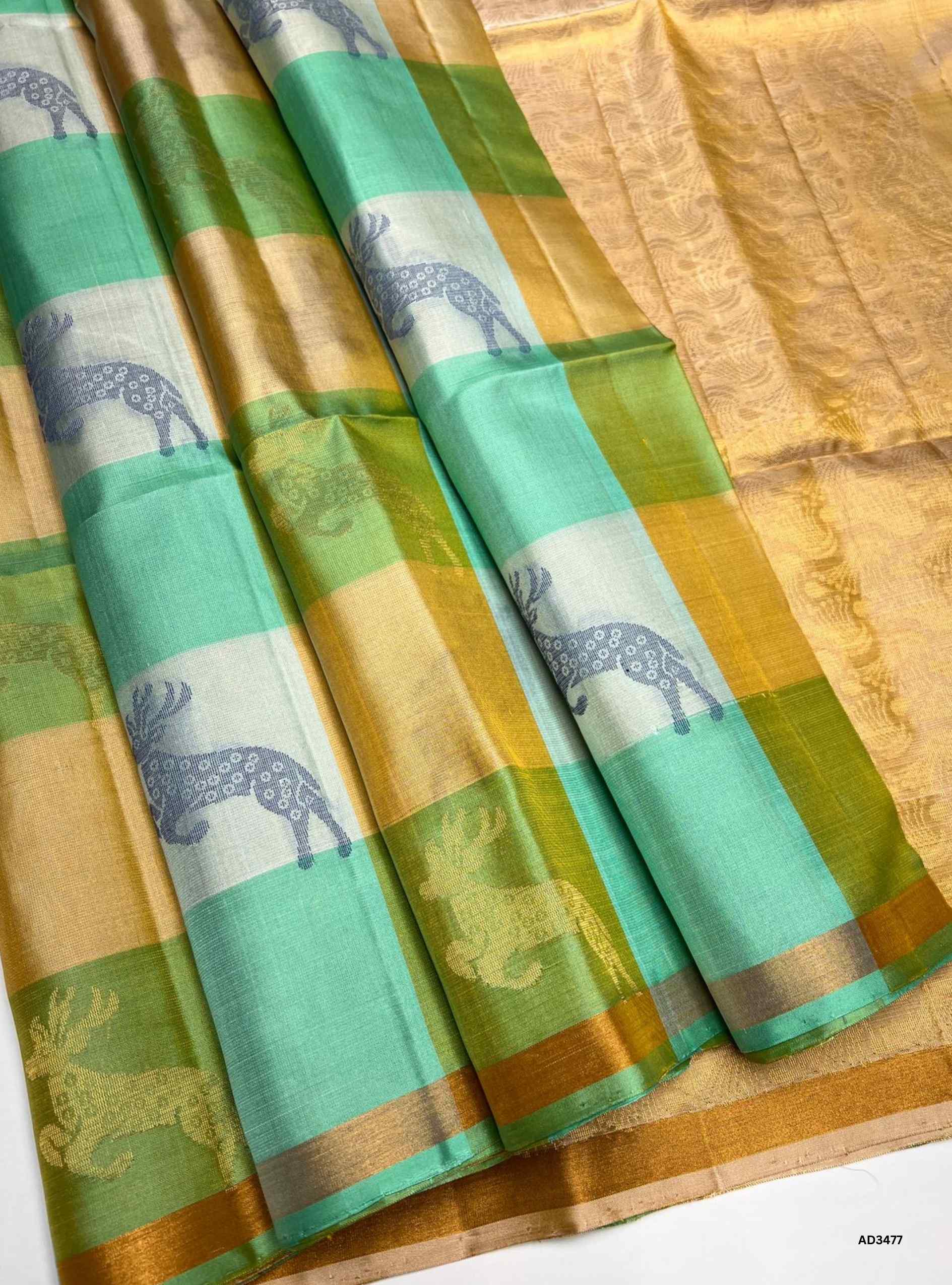 The Ice Blue & Cream Soft Silk Saree is a graceful handwoven creation featuring the traditional Pazhum Pazhamum checkered weave. The soothing ice blue base is beautifully contrasted with cream checks, while zari accents add a touch of brilliance. Perfect for weddings, festive occasions, and cultural gatherings, this saree blends heritage weaving with timeless elegance.