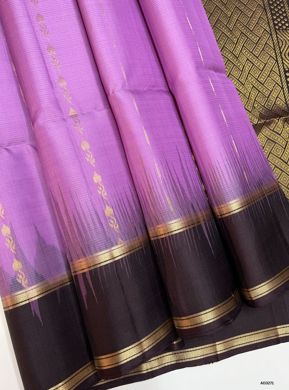 "Handwoven Lavender body with Dark Coffee Brown pallu Bhutta Soft Silk Saree featuring gold zari motifs and borders"