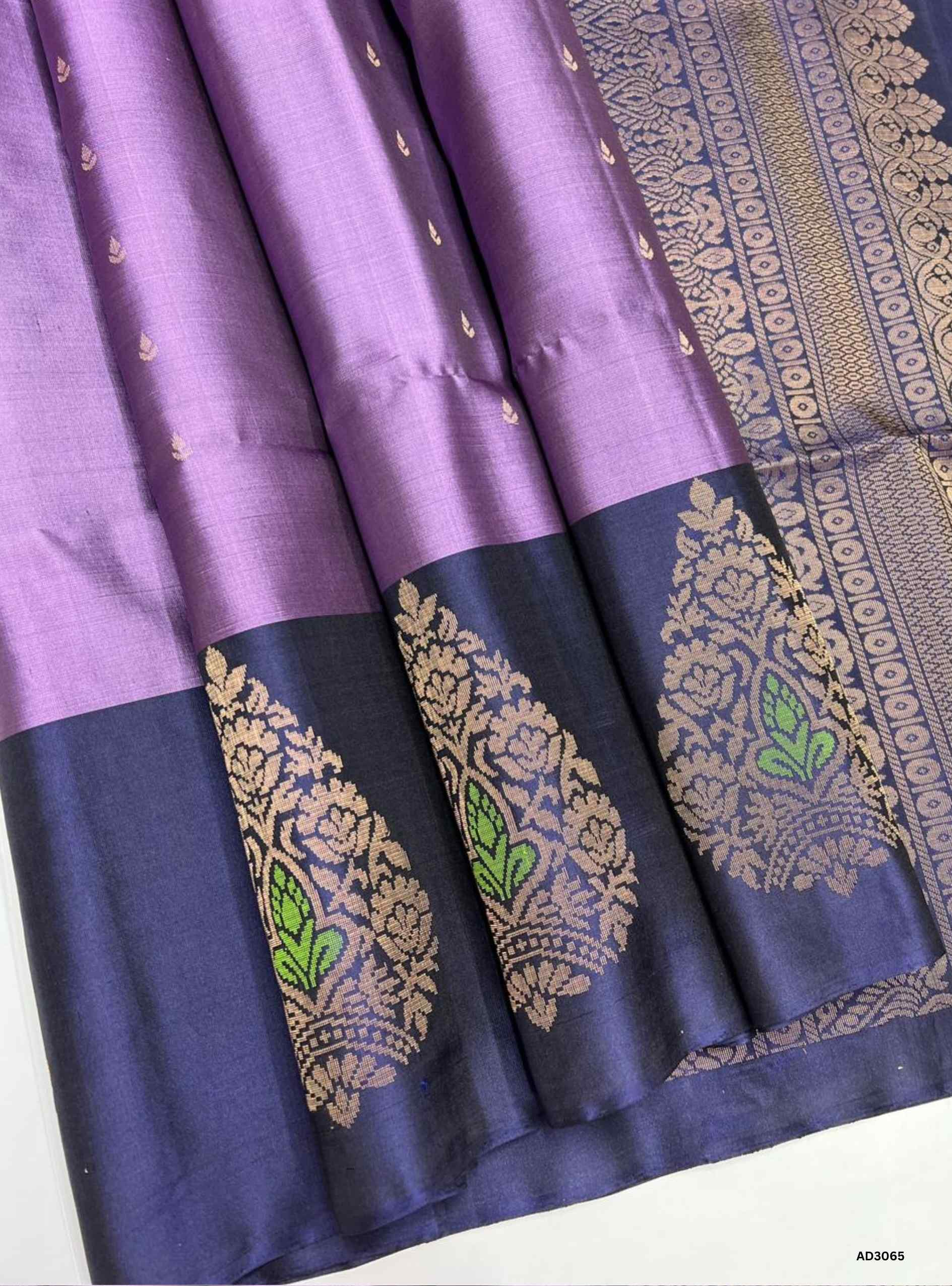 "Handwoven Lavender body with Navy Blue pallu Bhutta with Side Bhutta Soft Silk Saree featuring gold zari motifs"