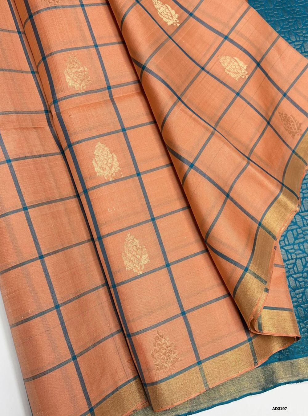 "Handwoven Peach body with Rama Green pallu Checkered Bhutta Soft Silk Saree featuring gold zari motifs and borders"