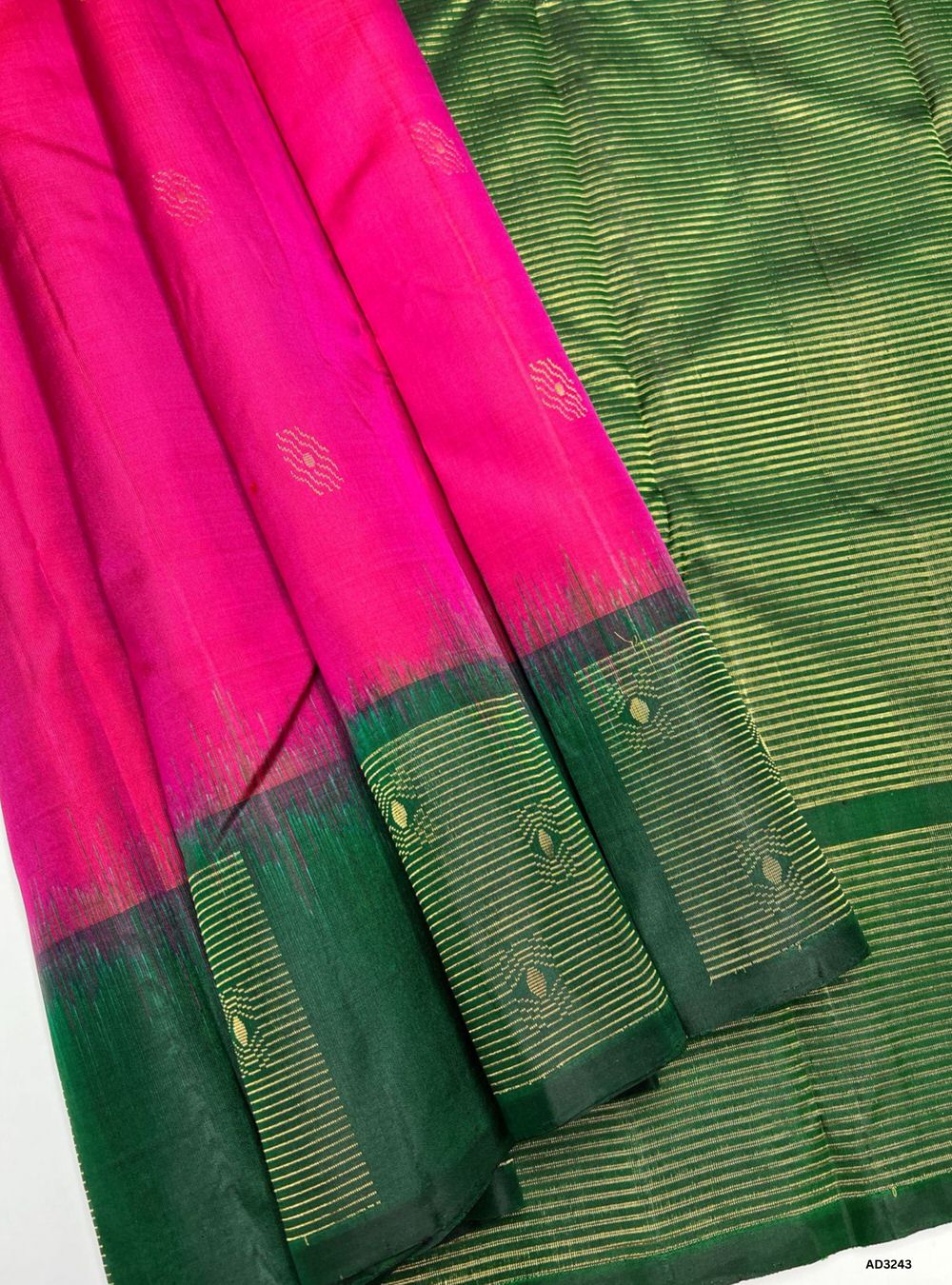 "Handwoven Pink body with Green pallu Fancy Bhutta Soft Silk Saree featuring gold zari border"