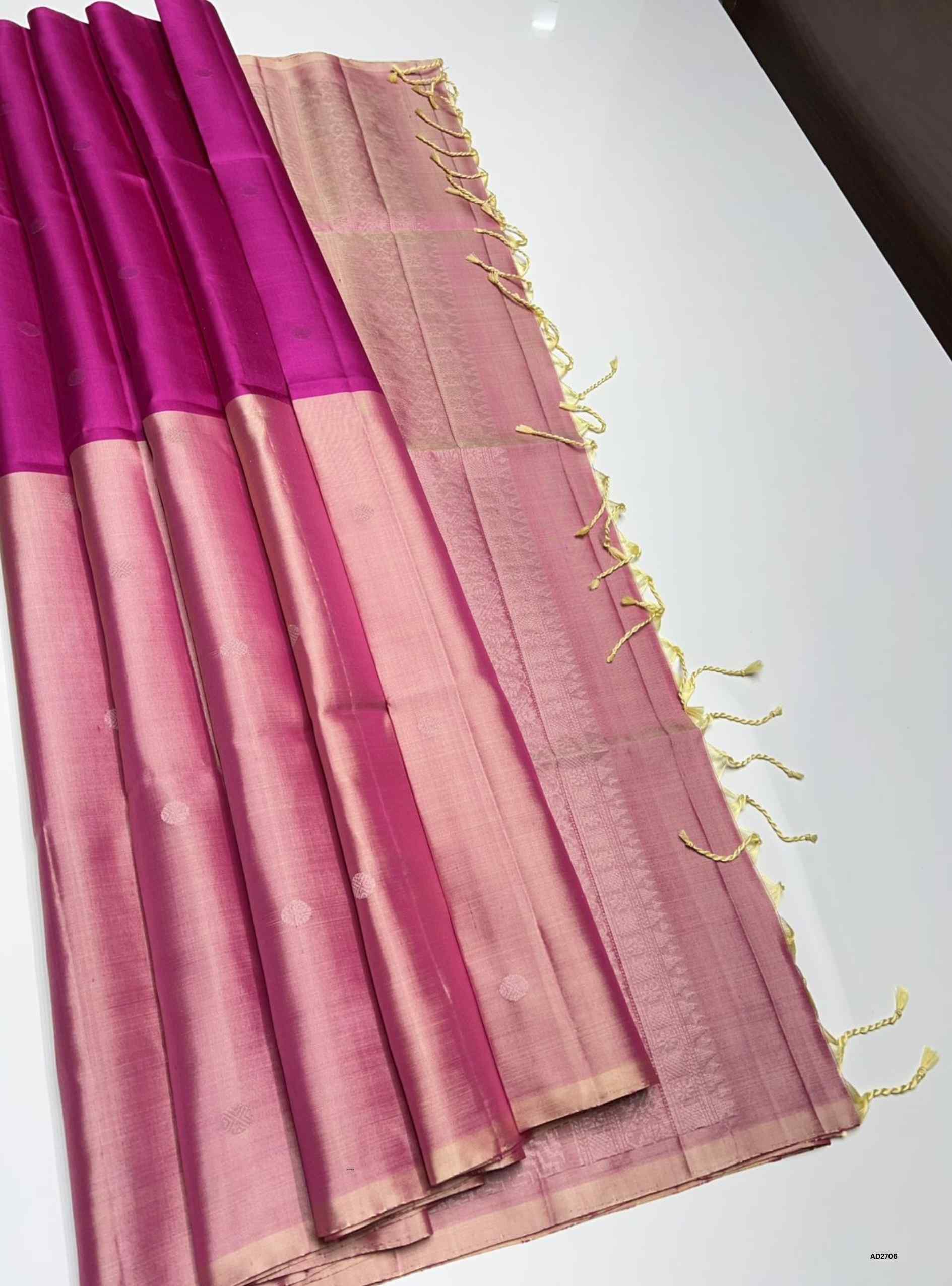 Pink saree with a purple border 