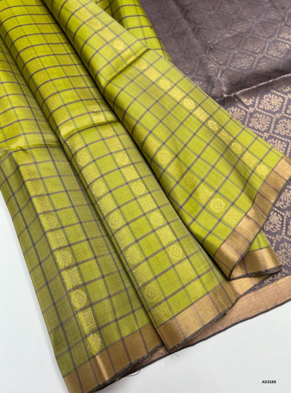 Green Soft Silk Saree with Grey Pallu and Checks with Bhutta Motifs