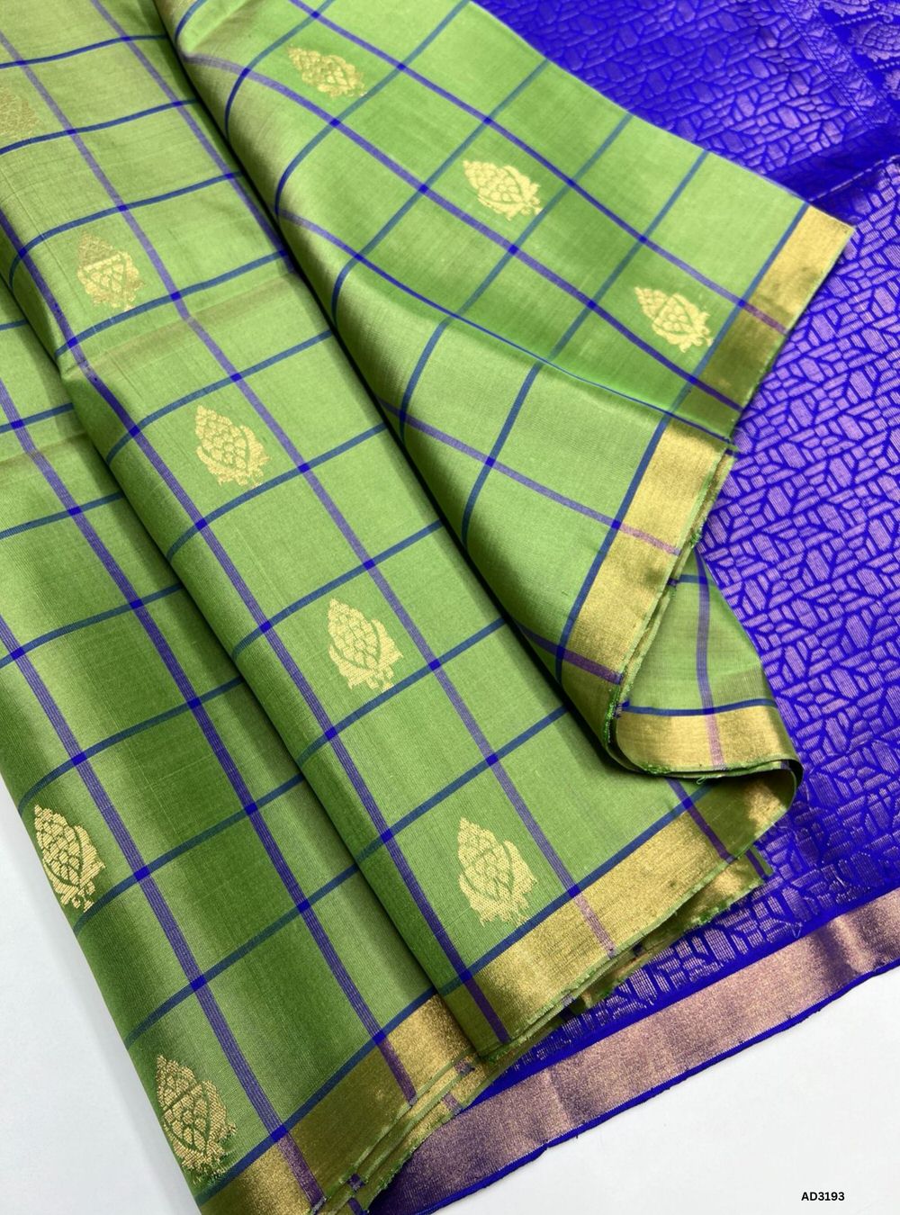 Green Soft Silk Saree with Royal Blue Pallu and Checks with Bhutta Motifs