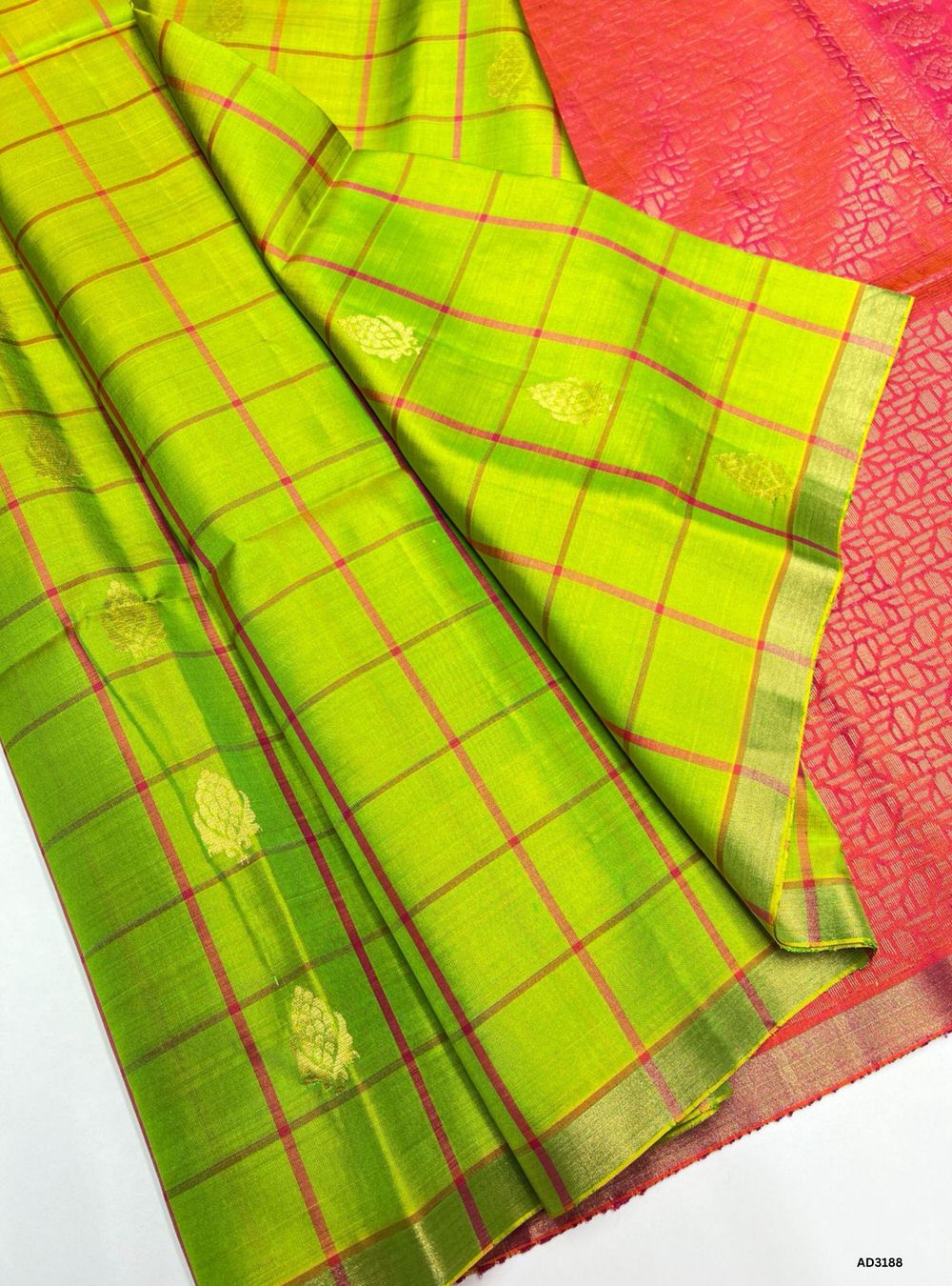 Lime Green Soft Silk Saree with Orangish Pink Pallu and Checks with Bhutta Motifs