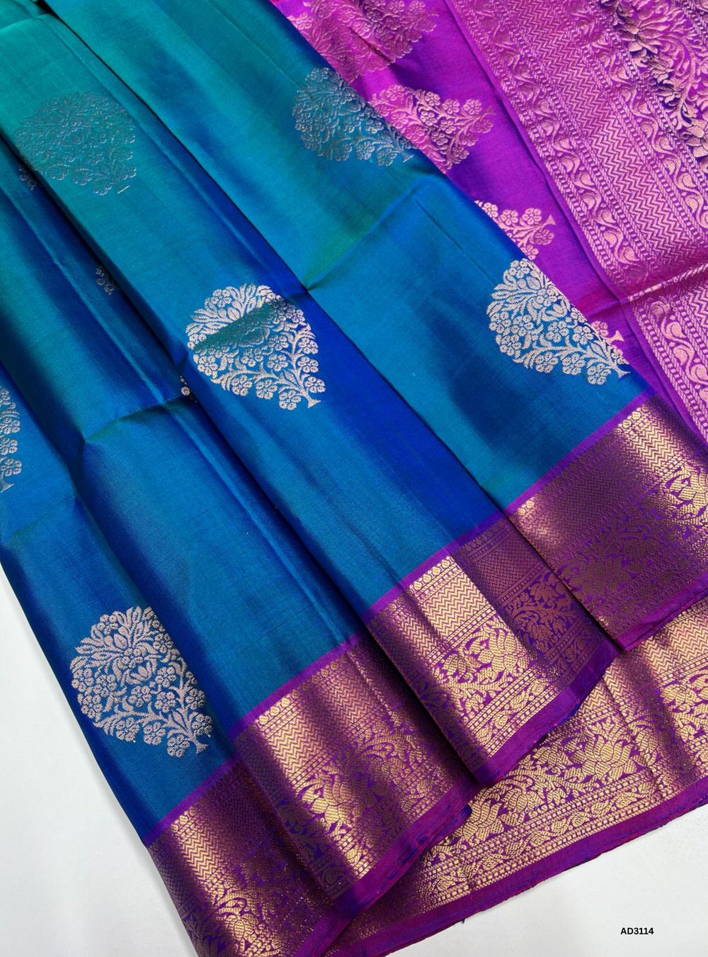Peacock Blue Soft Silk Saree with Magenta Pallu and Bhutta Jacquard Border