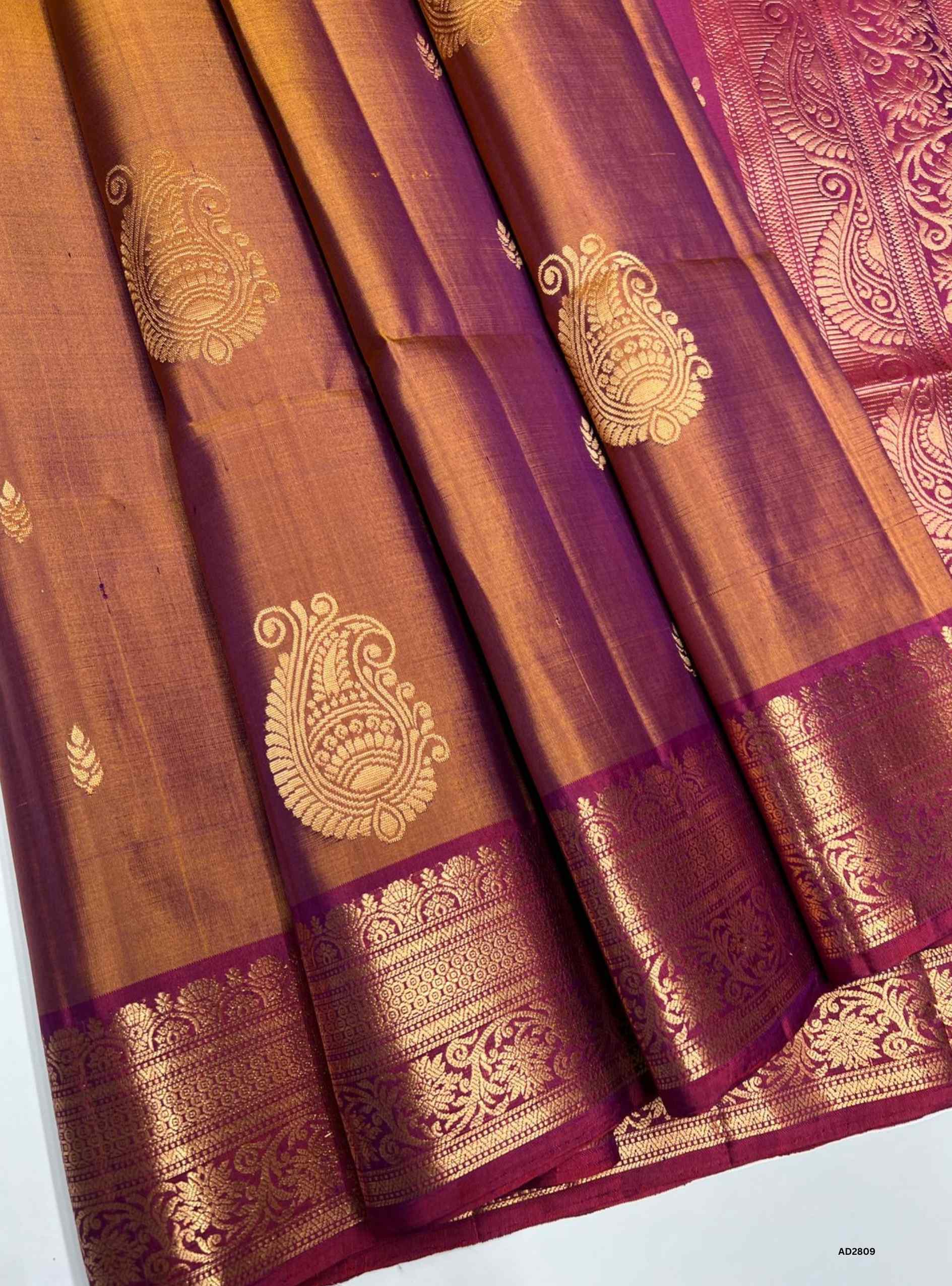 Soft Silk Saree in Bronze body with Brick Red pallu, Jacquard border design, Half Fine Gold Zari, Ikat handwoven motifs, 6.25m length including blouse.