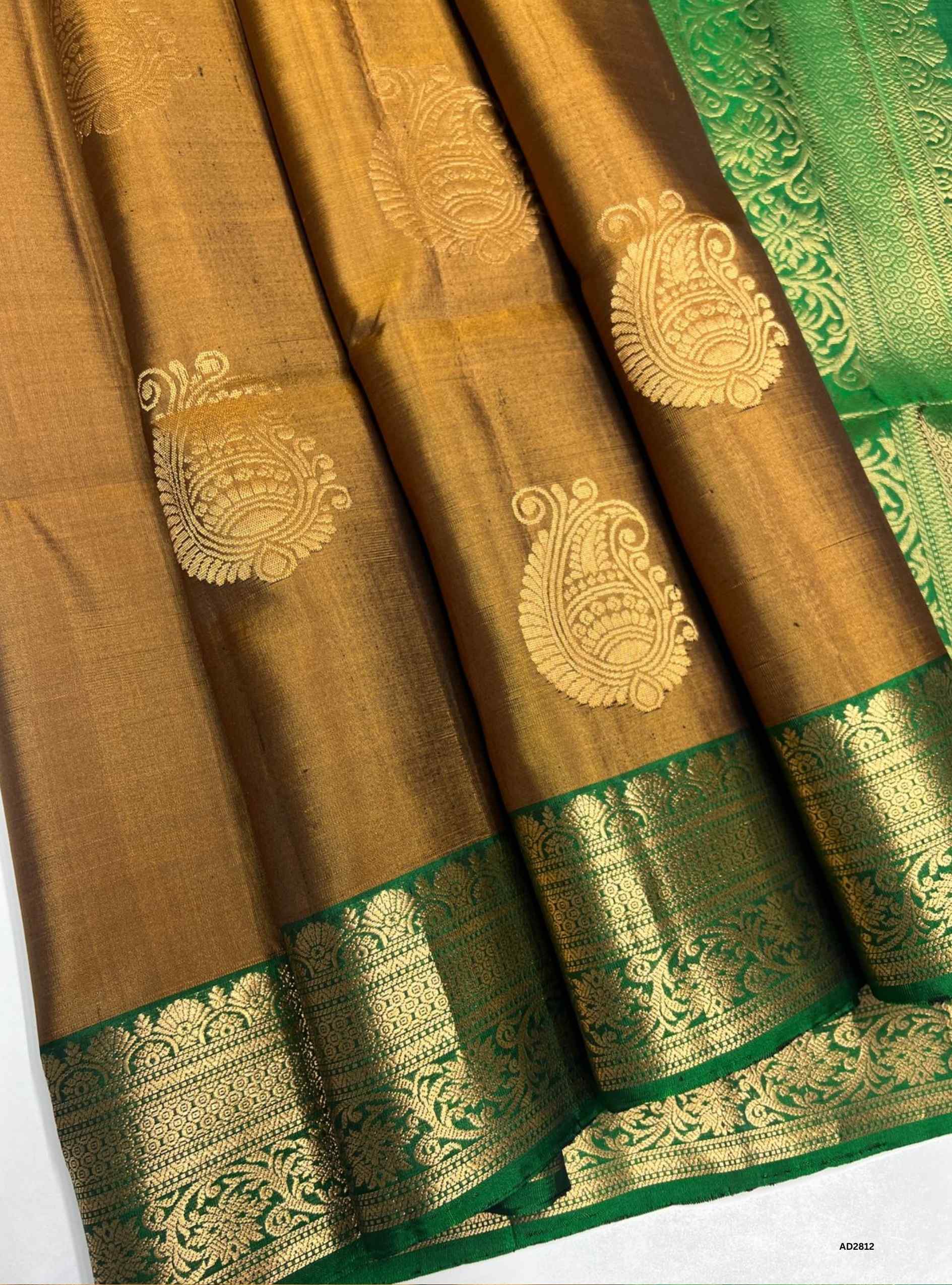 Soft Silk Saree in Dark Fenugreek body with Green pallu, Jacquard border design, Half Fine Gold Zari, Ikat handwoven motifs, 6.25m length including blouse.