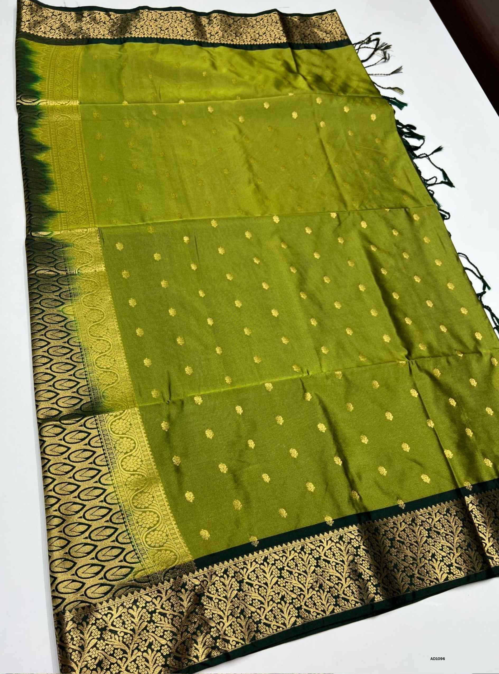 Green Semi Silk Saree with delicate gold buttas and rich contrasting border, 5.5m length plus blouse.