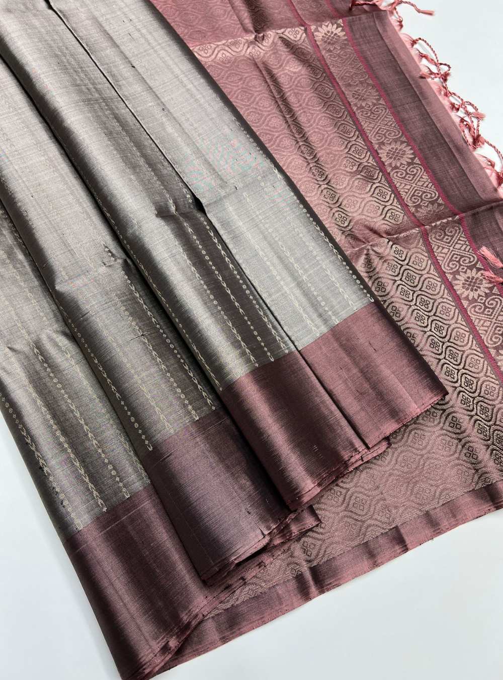Grey and Dusty Peach Soft Silk Saree with bhutta motifs and gold zari border, handwoven mulberry silk, festive wear.