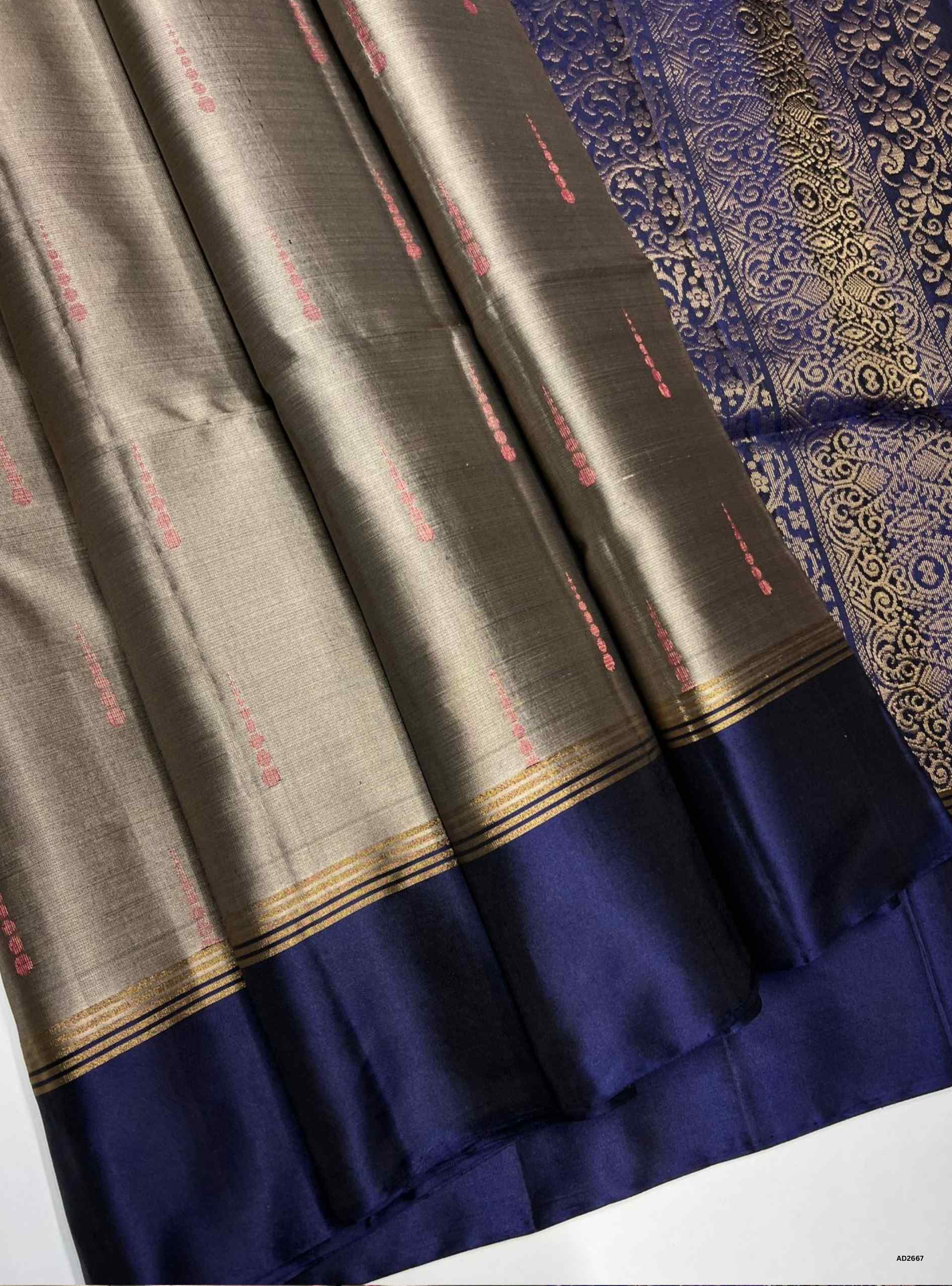 Grey and Navy Bhutta Soft Silk Saree with gold zari motifs.