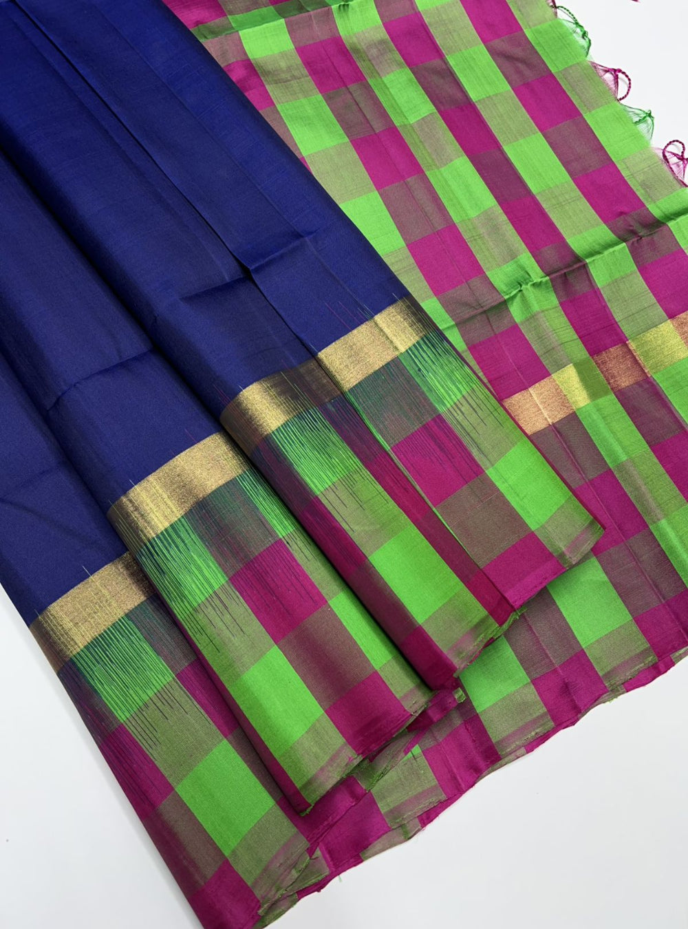 Ink Blue, Pink and Green Plain with Checkered Soft Silk Saree with gold zari motifs.