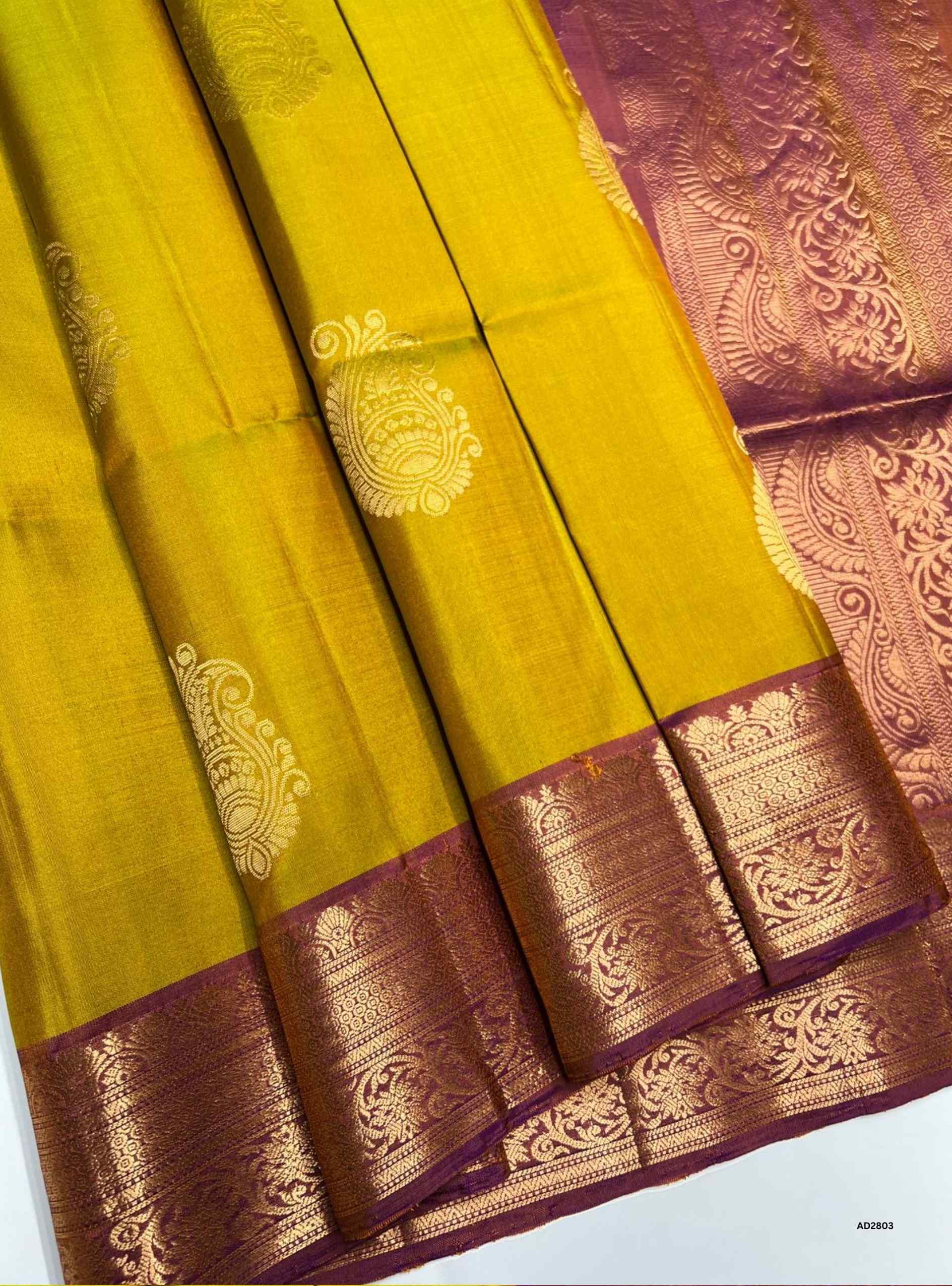 Soft Silk Saree in Light Lime Yellow body with Dark Raspberry pallu, Jacquard border design, Half Fine Gold Zari, Ikat handwoven motifs, 6.25m length including blouse.