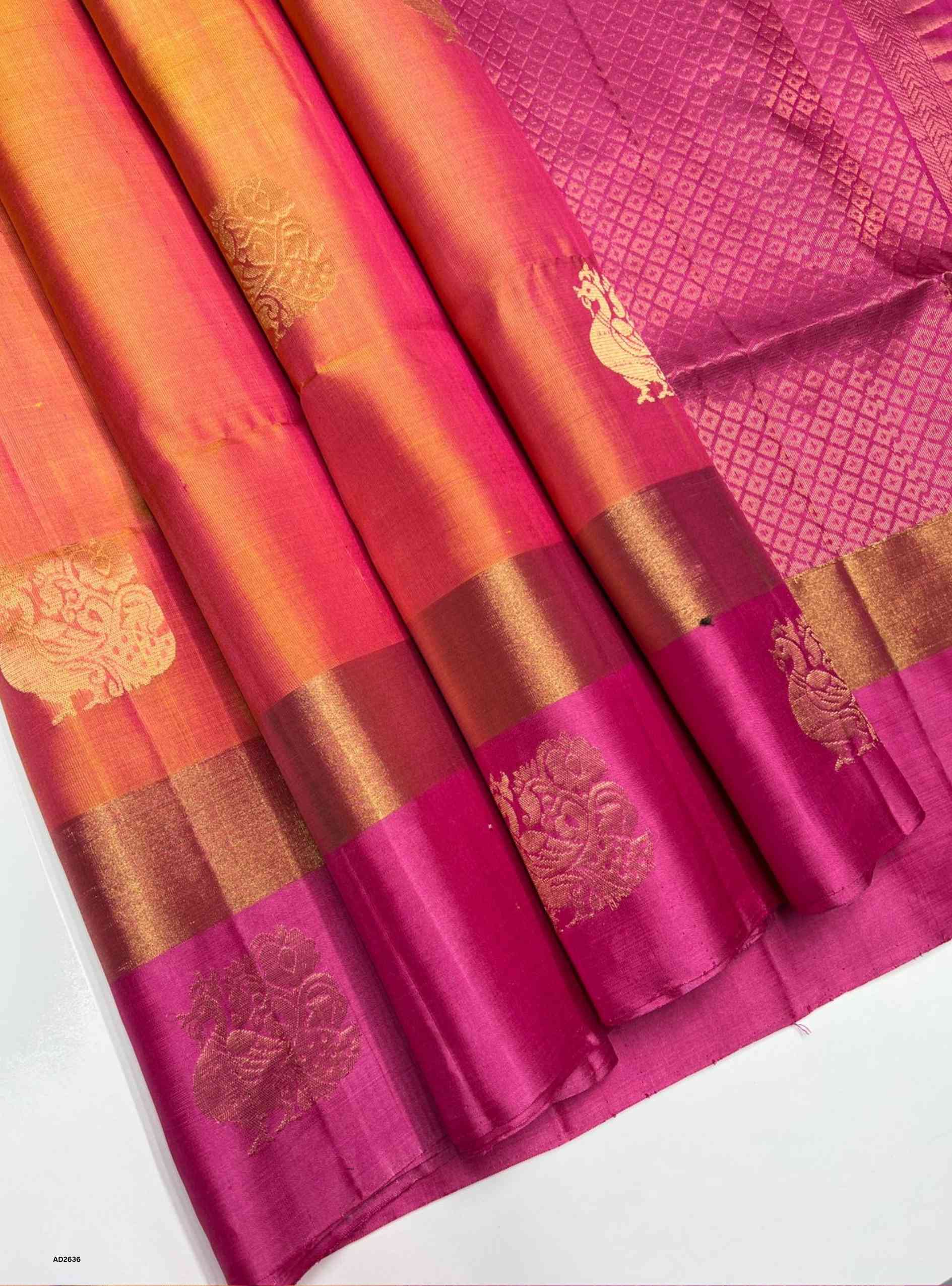 Mango Yellow and Pink Bhutta Soft Silk Saree with gold zari motifs.