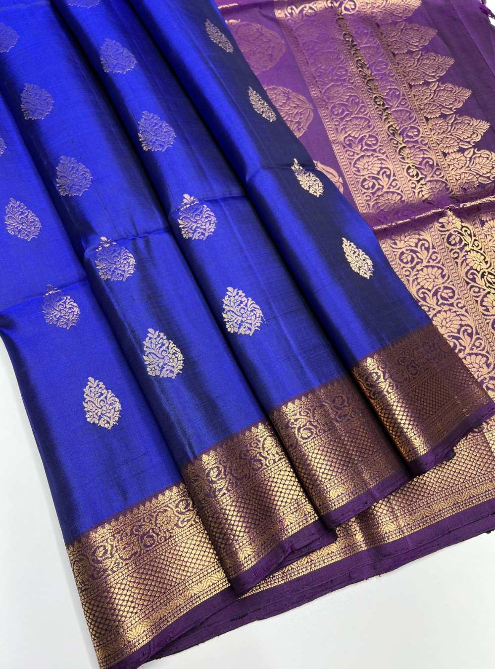 Navy and Plum Soft Silk Saree with jacquard border design and gold zari motifs.