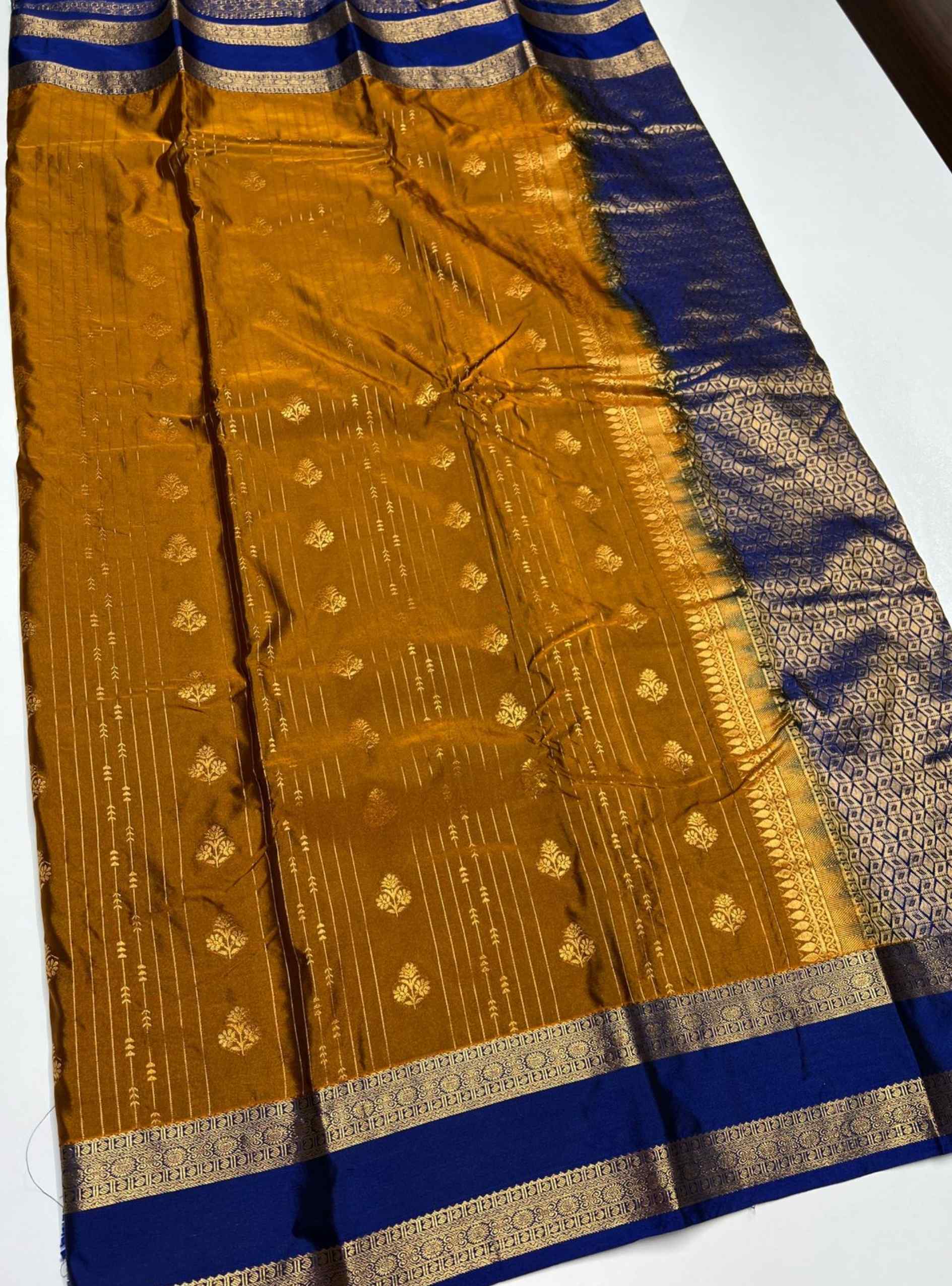 Peanut and Ink Blue Semi Silk Saree with delicate gold buttas and rich Ink Blue border, 5.5m length plus blouse.