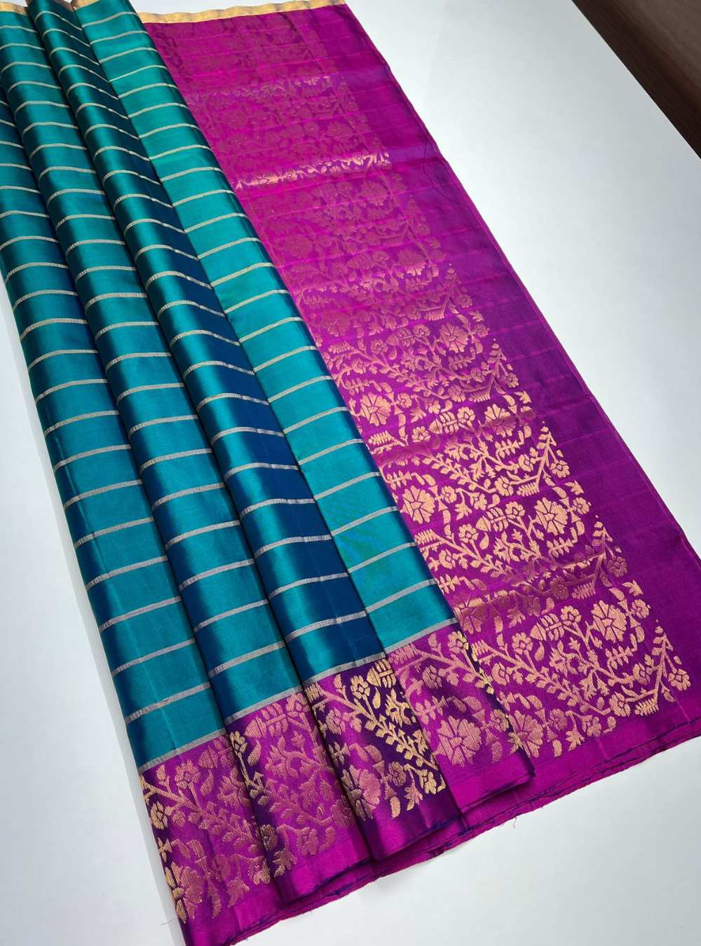 Rama Green and Purple Soft Silk Saree with jacquard border and gold zari motifs, handwoven mulberry silk, festive wear.