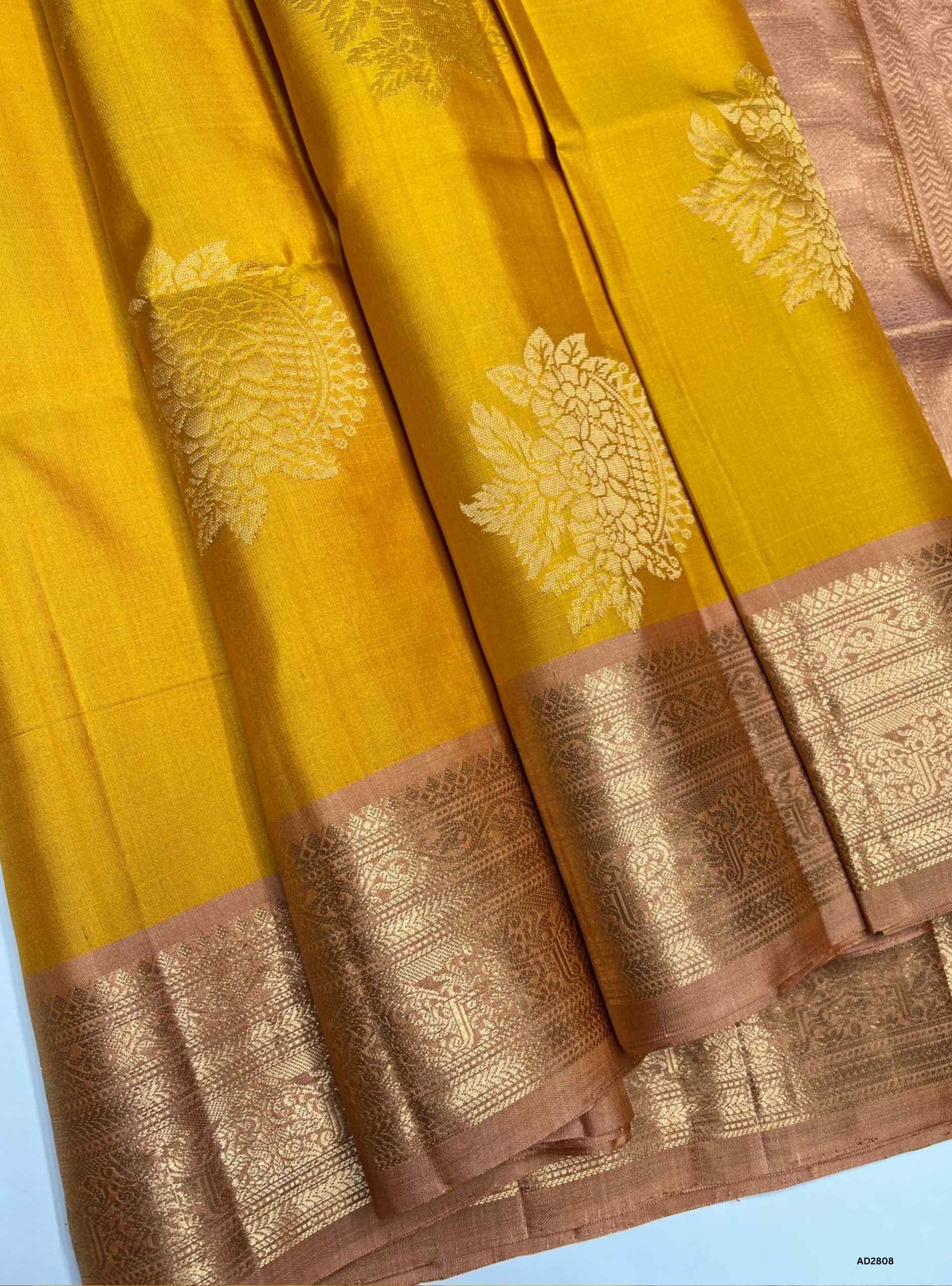 Soft Silk Saree in Yellow body with Peach pallu, Jacquard border design, Half Fine Gold Zari, Ikat handwoven motifs, 6.25m length including blouse.